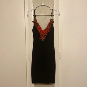 Mini Black dress with rose detail